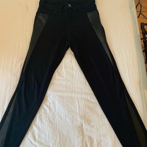 Tractr Ponte knit Jean. Has faux leather inserts at hips and down sides. Black.